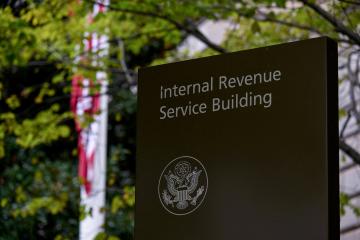 Internal Revenue Service sign in front of IRS headquarters